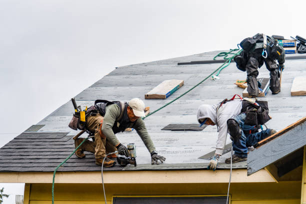 Professional Gutter Installation technician working in Okeana, OH